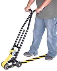 In simple terms, a floor tape applicator is a device that holds a roll of sticky marking tape and dispenses it onto a heavy duty wheel that places it smoothly onto the floor.
